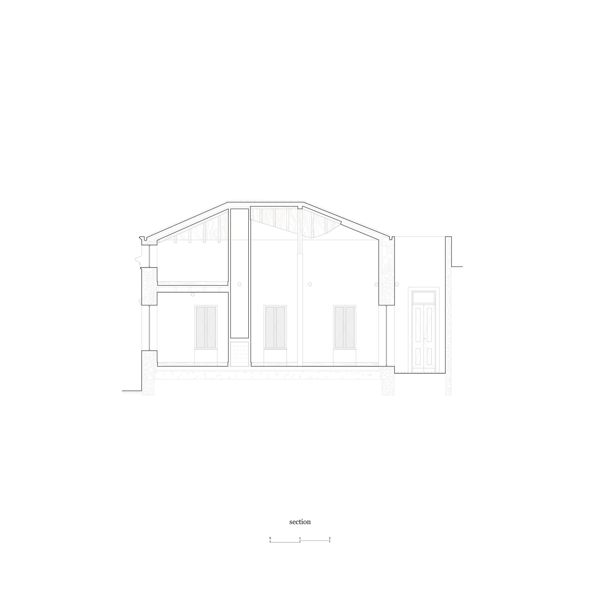 Second section showing the pine rafter structure and the wall cuts between rooms