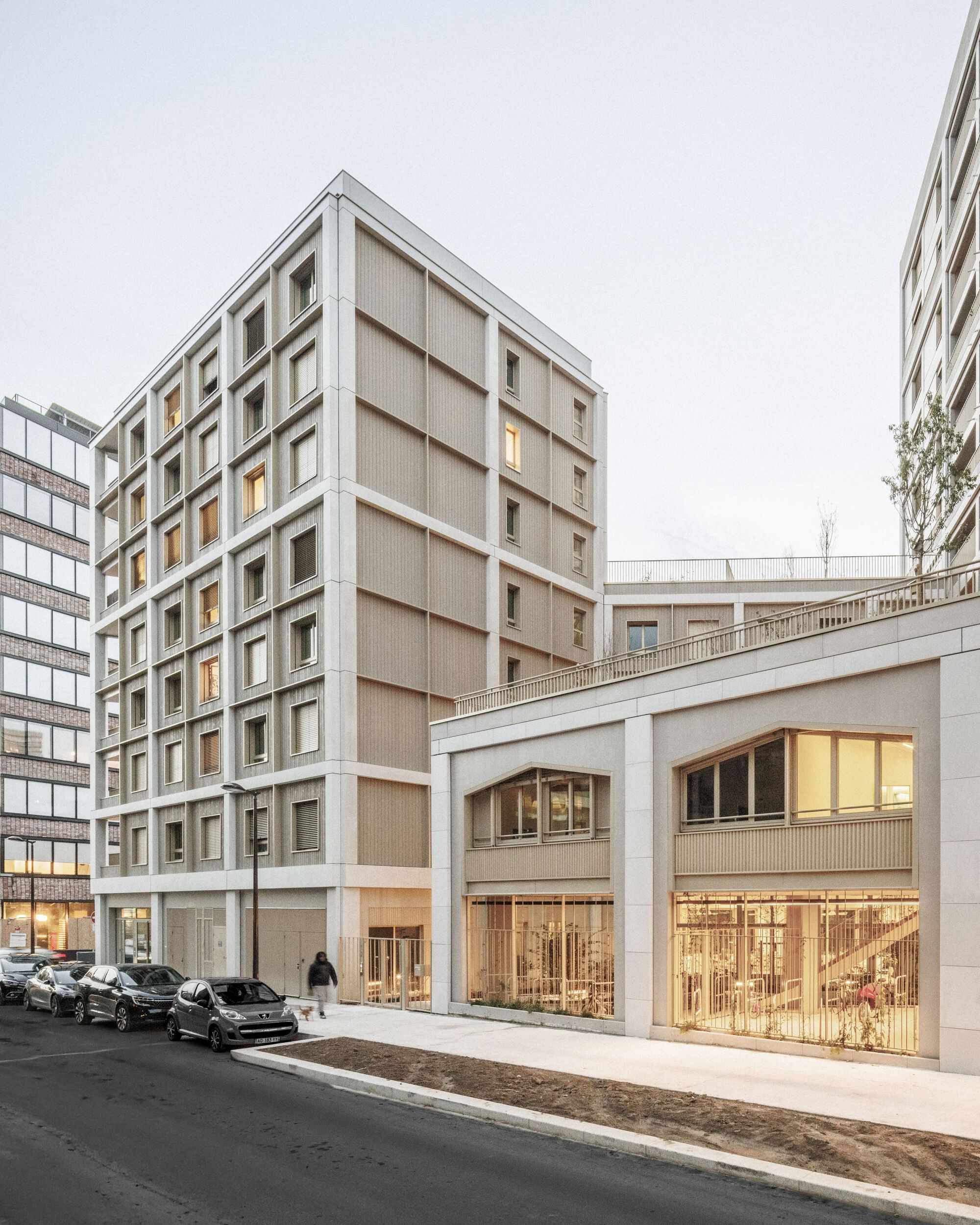 Beige student residence with the media library's arched windows on the ground floor