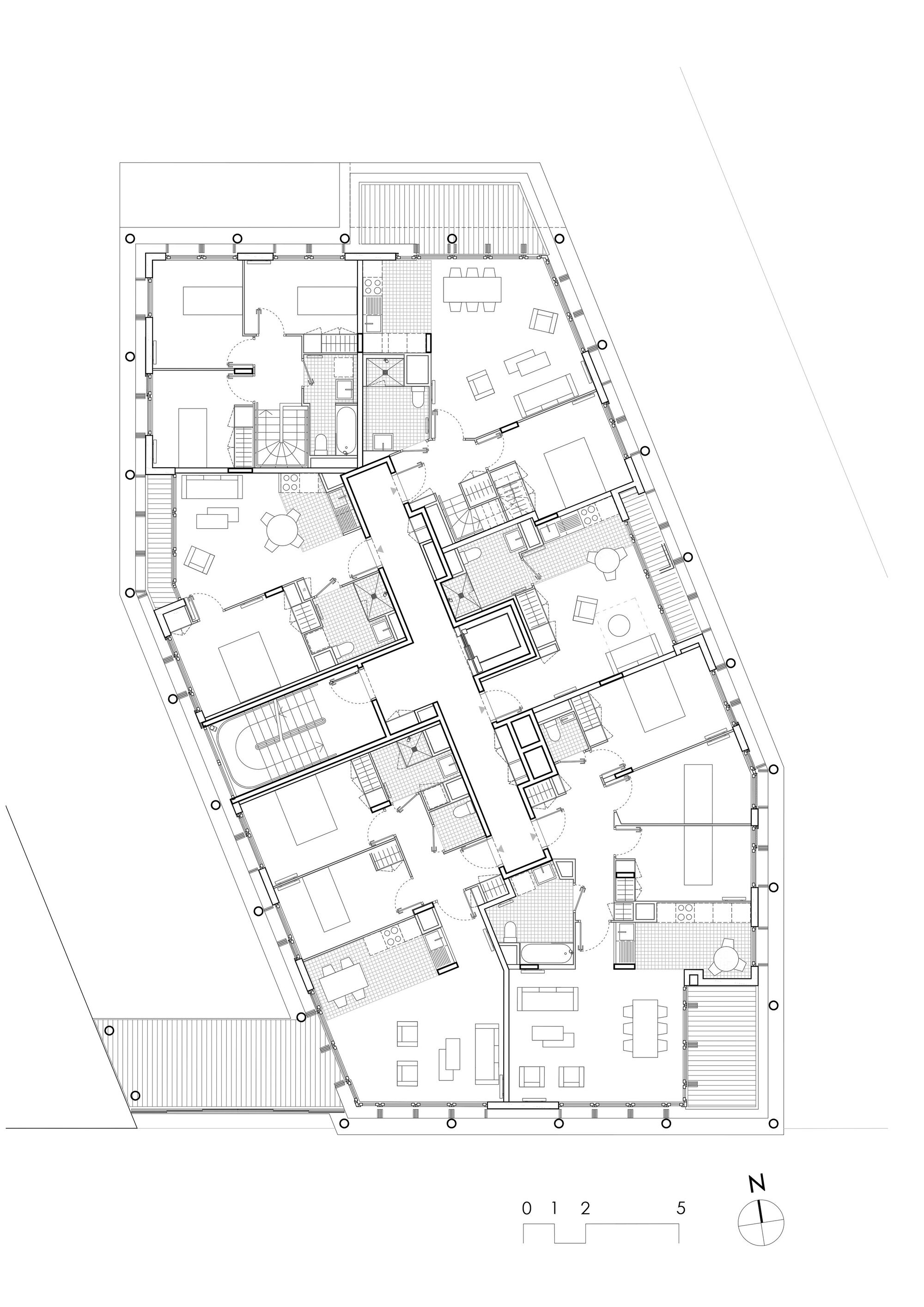 Typical upper-level plan of the family-flat building with the flat layouts