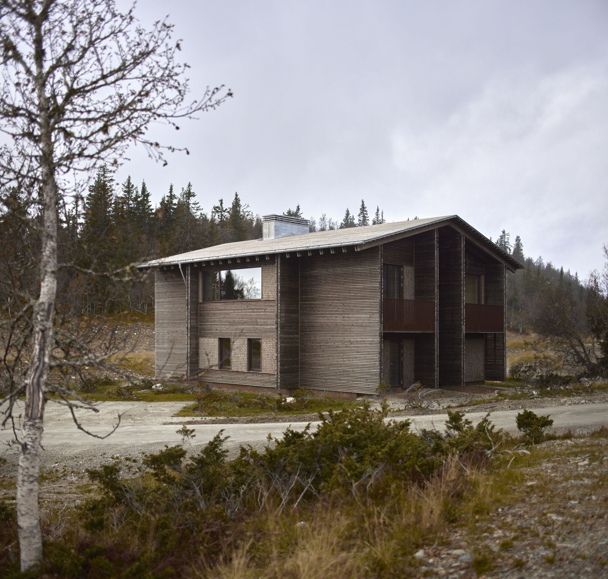Vinterro Cabins seen from the forest approach, Kvitfjell